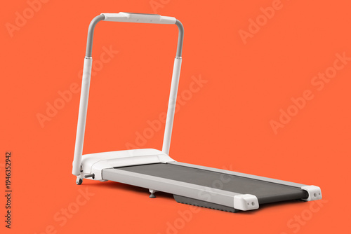 Modern treadmill on orange ...