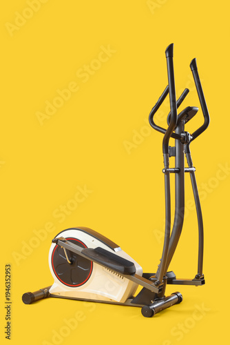 Modern exercising bike on y...