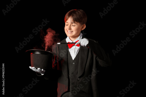 Little magician with wand a...