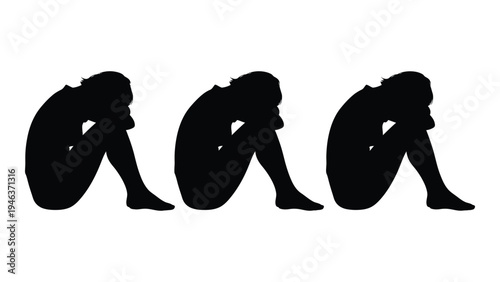 Three silhouettes of people sitting with their knees drawn up to their chests