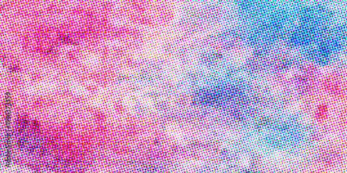 Vintage watercolor art background featuring a colorful grunge pattern of pink and violet paint on aged textured paper material