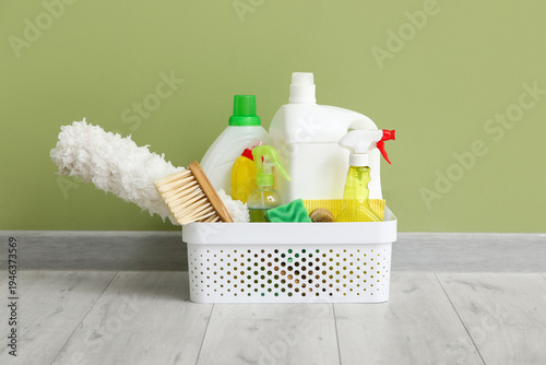 Basket with cleaning produc...