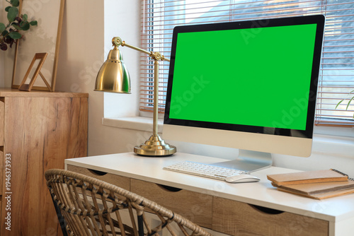 Stylish workplace with mode...