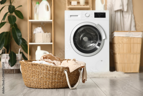 Laundry basket with dirty c...