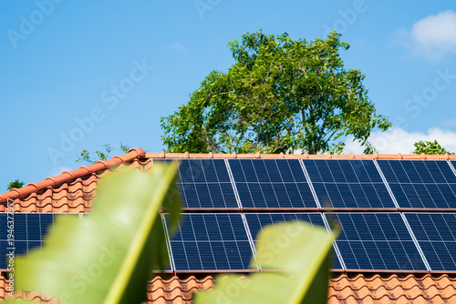 Foto Photovoltaic - Electricity generation with solar panels on the roof