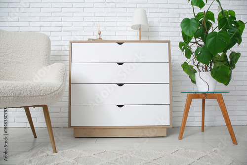 Chest of drawers with lamp ...