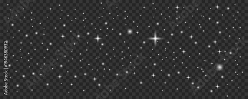 A dark background displays a dense scattering of bright white sparkling stars and glittering light effects