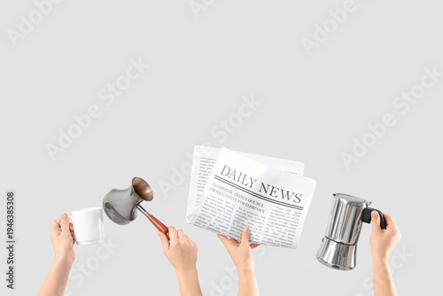 Female hands with newspaper...