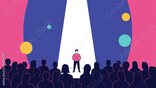 Inspirational public speaker stands confidently on a stage under a bright white spotlight while an audience watches from the dark theater seats.