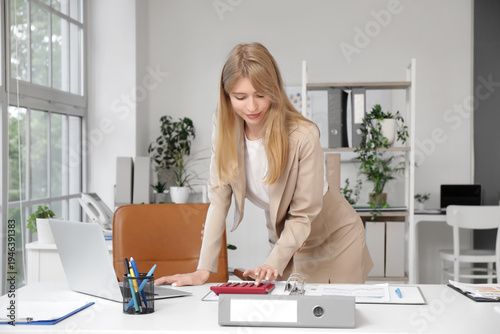 Young female accountant wor...