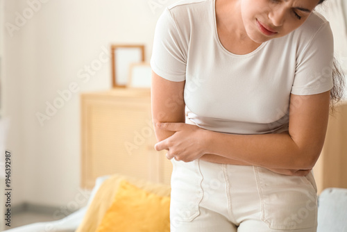 Young woman suffering from ...