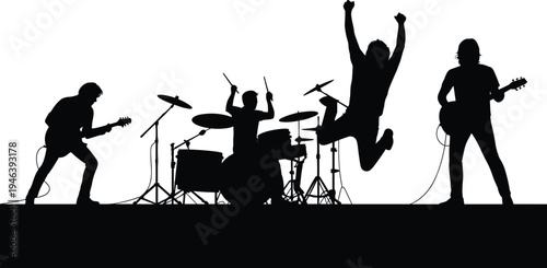 Silhouette of a rock band performing on stage with a drummer and guitarists music concert