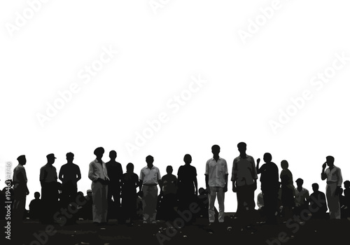 Diverse group of people standing and sitting depicted as dark grey graphic silhouettes against white.