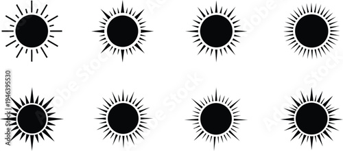 Set of eight black sunburst vector graphic designs with varying ray styles