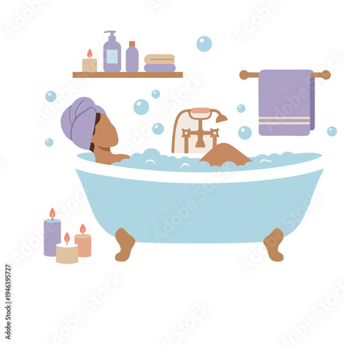 Woman relaxing in a warm bubble bath at home with candles