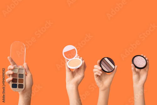 Female hands with eyeshadow...