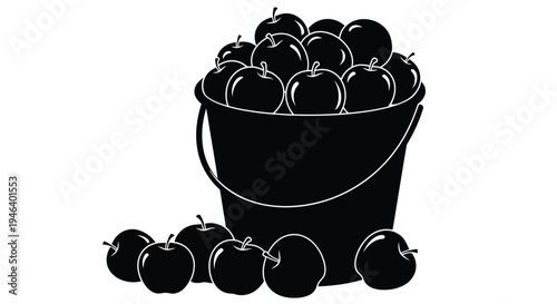 A black and white illustration of a basket overflowing with apples