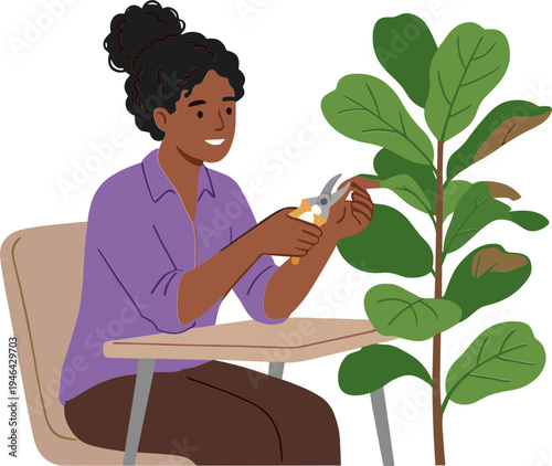 Woman sitting indoors cutting a plant with scissors on a table