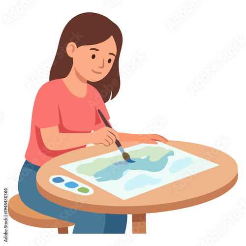 A girl sitting at a table is painting a beautiful landscape with a brush.