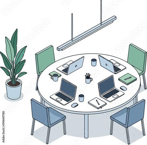 Empty coworking space featuring round table with laptops