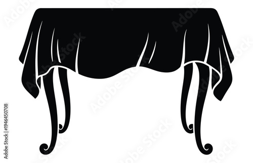 A black silhouette of a table with a decorative tablecloth