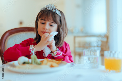 Canvastavla Girl with Princess Tiara Wipes Herself with Napkin at the Table