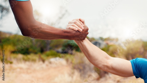 Help, runner and team with hands of men outdoor for workout partner, fitness and support together. Exercise club, assistance and training aide with friends in nature for sports, synergy and health