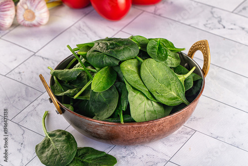 Raw fresh green spinach leaves