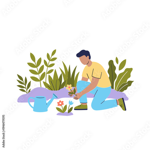A man is kneeling and watering a flower with a watering can in a garden.