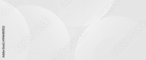 Minimalist technology background with luminous white circular geometric lines on gray, creating a sleek and modern design suitable for branding, covers, and promotional materials.