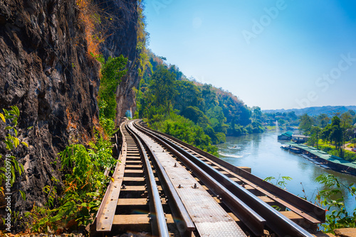 The Death Railway crossing kwai river with Krasae Cave in Kanchanaburi Thailand. Important landmark and destination to visiting and world war II history builted