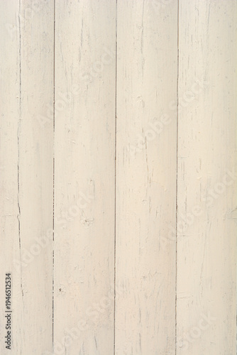 Rustic background featuring weathered vertical wooden planks painted in a distressed off white or light cream color with visible texture and grain