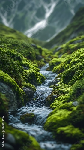 Idyllic mountain stream flowing through mossy terrain on a verdant slope