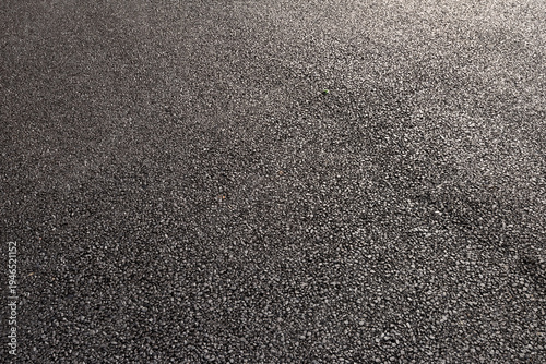 Wallpaper Mural High angle view of gray asphalt road surface texture with sunlight reflection Torontodigital.ca