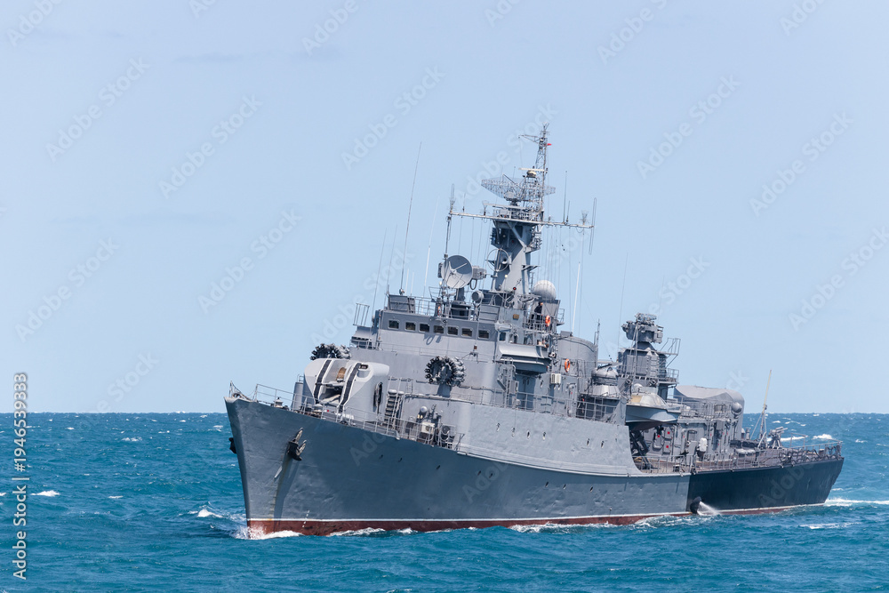 Obraz premium Navy frigate sail on the smooth sea during mission of protect and rescue in sea.