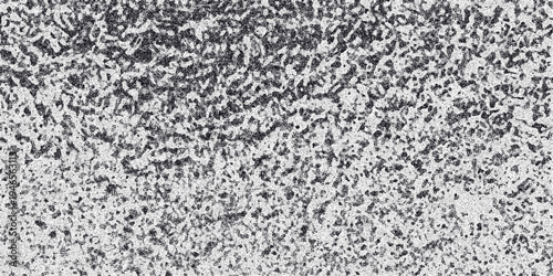 Grayscale textured background with a rough organic pattern resembling distressed metal or weathered stone with subtle speckling and irregular dark and light patches