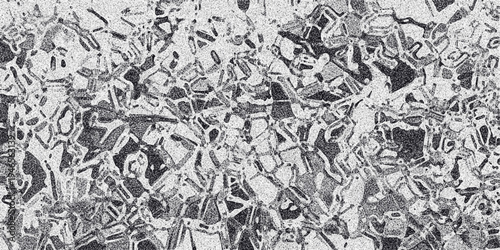 Monochromatic abstract pattern of interconnected geometric shapes with a grainy texture resembling shattered glass or a complex mosaic in grayscale