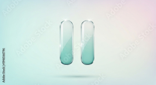 Two translucent capsules with green liquid inside floating.