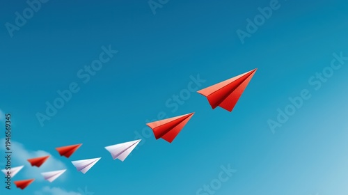 Red and white paper planes flying high in a clear blue sky, symbolizing freedom, ambition, reaching for the stars, goal achievement, and collaborative success in a competitive world.