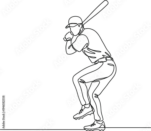 Baseball player in ready stance with bat over shoulder