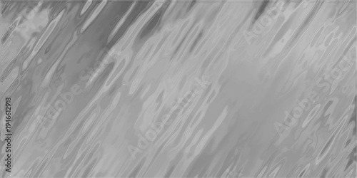 Abstract metallic texture with flowing silver gray wavy lines and smooth reflective surfaces creating a modern and sophisticated background design