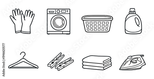 Laundry appliances and accessories arranged on dark backdrop
