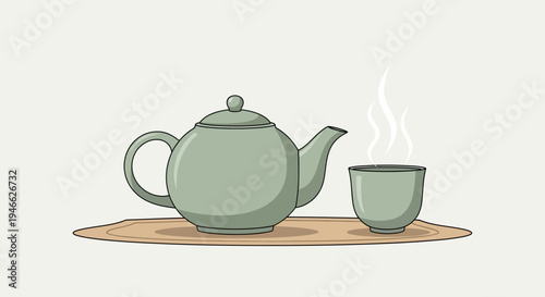A teapot and a cup of tea on a wooden tray indoors