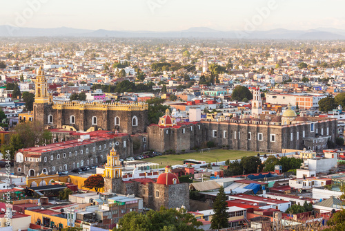 Aerial view over the Parroquia de San Andres Apostol and the downtown of Cholula, Puebla, Mexico