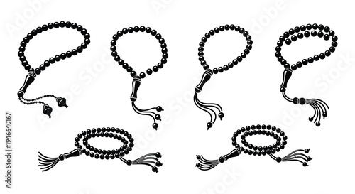 Four black islamic prayer beads tasbih and misbaha displayed together