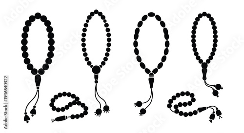 Four black islamic prayer beads tasbih and misbaha displayed together