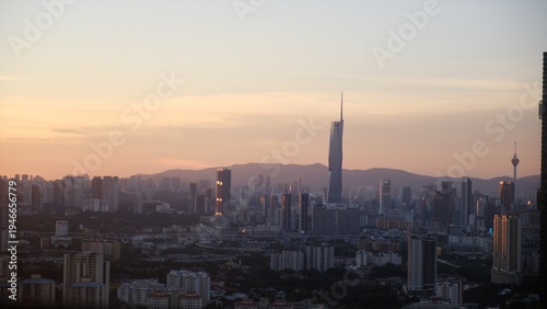 Billede på lærred Kuala lumpur skyline illustrating a sprawling city, modern skyscrapers, and urba