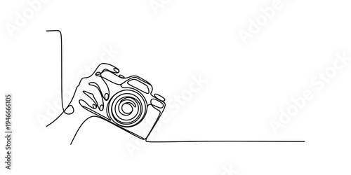 Continuous one line drawing of a hand holding a professional dslr camera on white background Vector, illustration