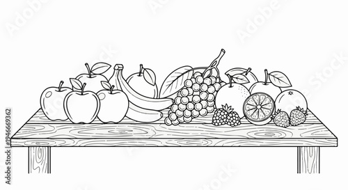 Assortment of fresh, ripe fruits arranged artfully on a wooden table