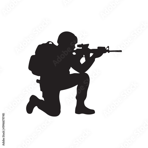 Silhouette of a soldier kneeling and aiming a rifle, ready for action or combat.